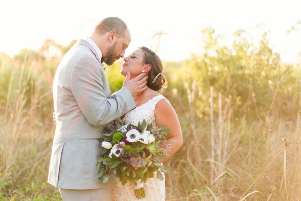 bride and groom about to kiss