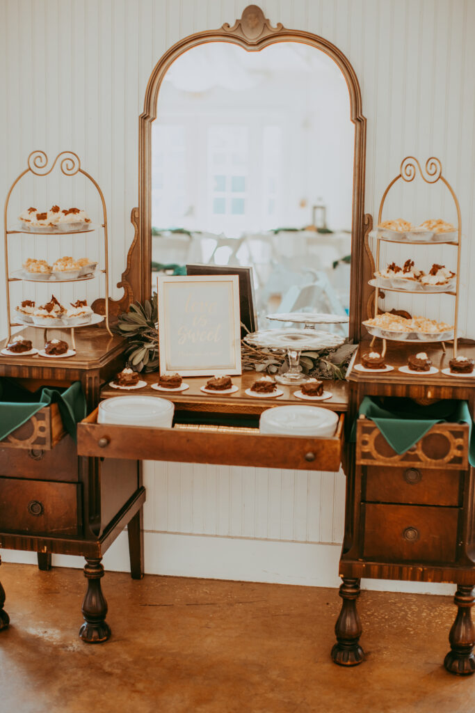 old dresser used as cupcake stand for wedding