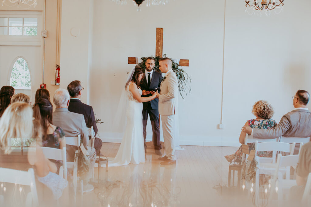 indoor wedding ceremony at the banyan estate