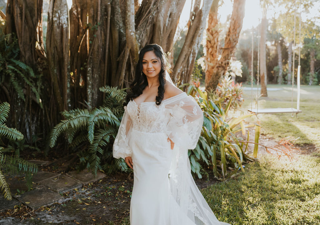 bride in flowly long sleeve gown