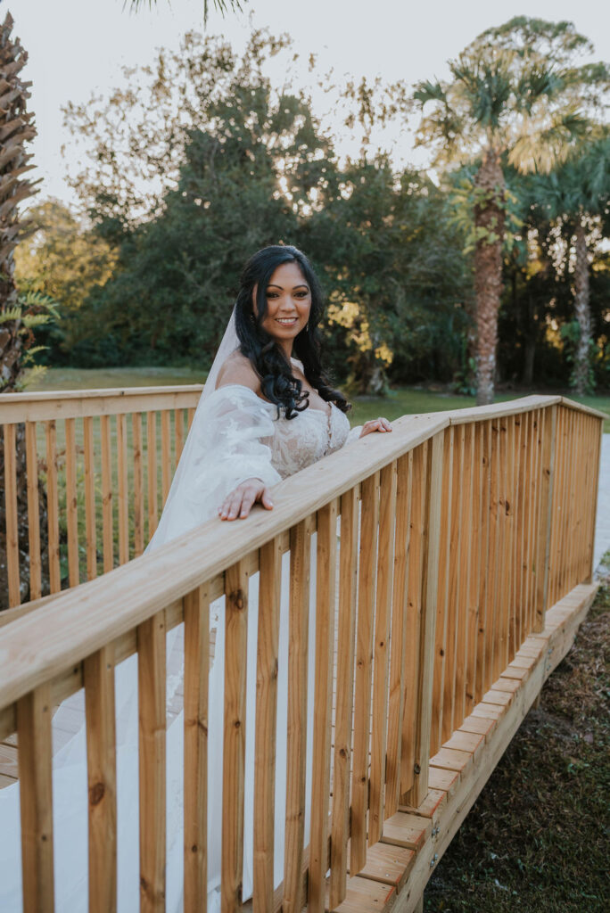 bride on wooden bridge