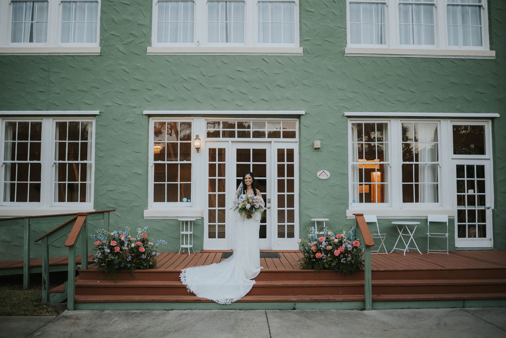 bride on the banyan estate steps