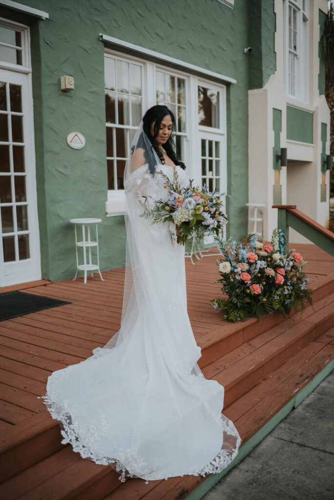 bridal portrait on the banyan estate porch steps