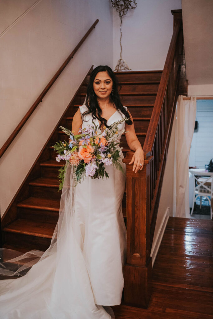 bride on wooden stairs