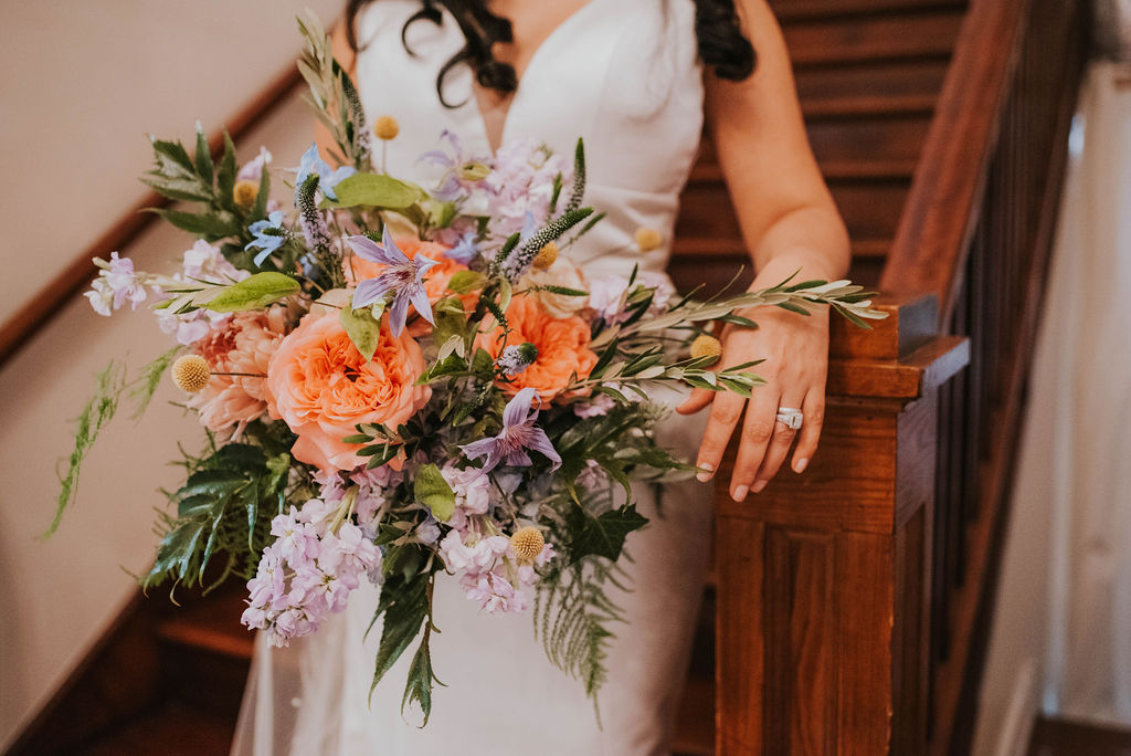 detail shot of bridal bouquet and bride's rings