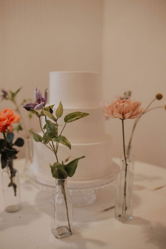 simple wedding cake with spring flowers